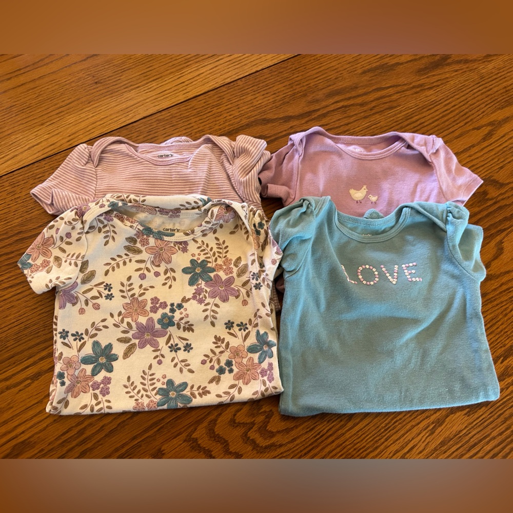 Bundle of 4 Carter’s Baby Onesies